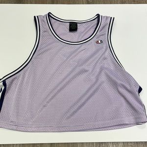 crop purple champion tank top jersey. size medium. could fit a small or medium